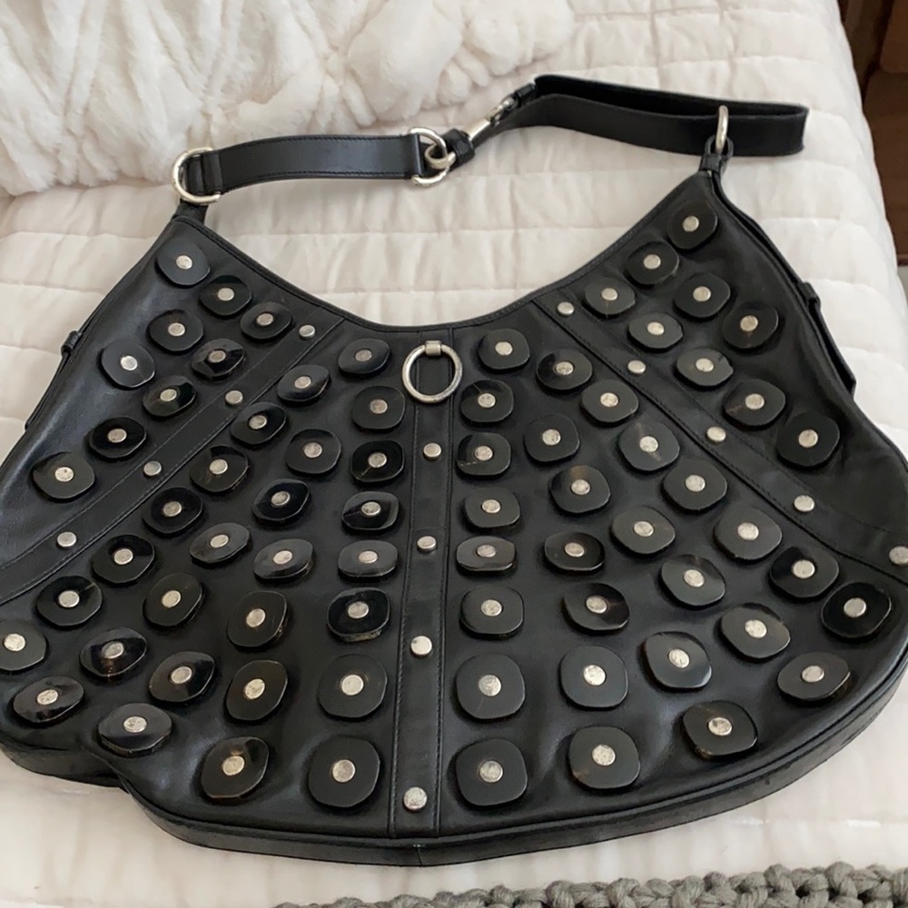 YSL handbag with bead fixtures.